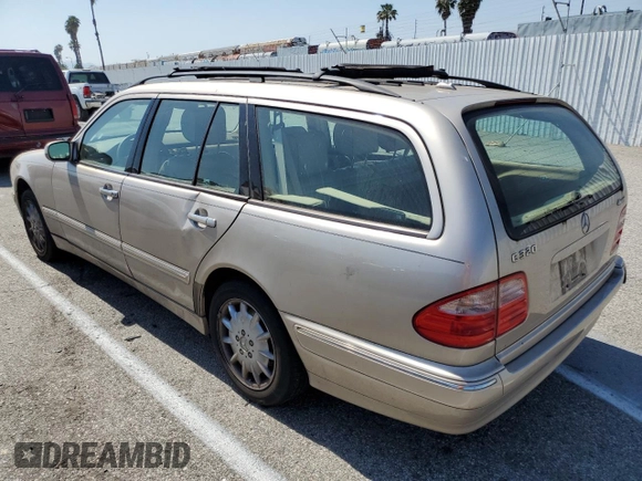 2000 Mercedes-Benz E-Class AWD with VIN WDBJH82J8YX042547, listed as a Copart auction lot 58063494 with 138,392 mi miles and Salvage Title. Bid and sale history available at carsss.com. Image 2.