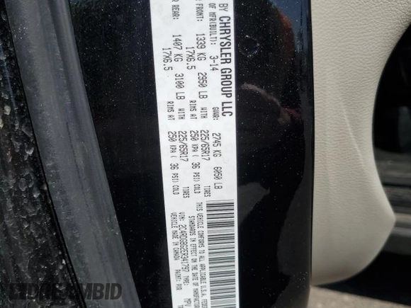 2014 Dodge Grand Caravan SE with VIN 2C4RDGBG2ER341797, listed as a Copart auction lot 49439405 with 102,633 mi miles and Salvage Title. Bid and sale history available at DreamBid. Image 15.