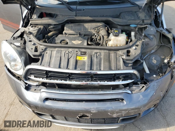 2016 MINI Countryman S z VIN WMWZC5C5XGWU21117, wystawiony jako Copart lot #65241505 z przebiegiem Nie podano mil oraz Szkoda całkowita • Salvage title. Historia ofert i sprzedaży dostępna na DreamBid. Obrazek 11.