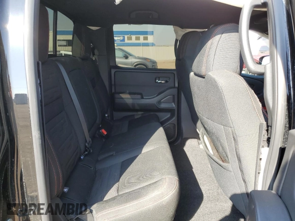 2023 Nissan Frontier Pro-4X with VIN 1N6ED1EK9PN653818, listed as a Copart auction lot 50932735 with 55,466 mi miles and Salvage title. Bid and sale history available at DreamBid. Image 11.
