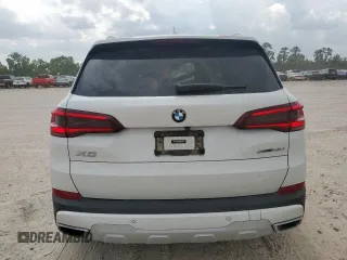 2021 BMW X5 sDrive40i with VIN 5UXCR4C06M9F56578, listed as a Copart auction lot 58218315 with 69,927 mi miles and Salvage title. Bid and sale history available at DreamBid. Image 6.