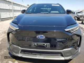 2024 Subaru Solterra Premium z VIN JTMABABA9RA064491, wystawiony jako Copart lot #52993485 z przebiegiem 9079 mil mil oraz Szkody całkowita. Historia ofert i sprzedaży dostępna na DreamBid. Obrazek 5.