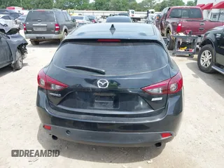 2014 Mazda 3 i Grand Touring z VIN JM1BM1M75E1151329, wystawiony jako IAAI lot #42248334 z przebiegiem 138 748 mil mil oraz . Historia ofert i sprzedaży dostępna na DreamBid. Obrazek 16.