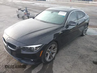 2019 BMW 4 Series 430i with VIN WBA4J1C53KBM17029, listed as a IAAI auction lot 41933607 with 54,107 mi miles and . Bid and sale history available at DreamBid. Image 18.