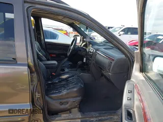 2000 Jeep Grand Cherokee Limited с VIN 1J4GW58N8YC241982, выставлен на аукционе IAAI как лот 42481556 с пробегом 179 233 миль миль и . История ставок и продаж доступна на DreamBid. Изображение 5.