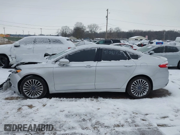 2017 Ford Fusion Titanium with VIN 3FA6P0K91HR117198, listed as a IAAI auction lot 41346552 with 76,951 mi miles. Bid and sale history available at carsss.com. Image 14.