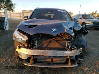 2017 BMW X1 xDrive28i with VIN WBXHT3C30H5F71865, listed as a Copart auction lot 67841122 with 75,471 mi miles. Bid and sale history available at carsss.com. Image 5.