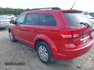 2018 Dodge Journey SE with VIN 3C4PDCAB0JT208761, listed as a IAAI auction lot 41918737 with 117,327 mi miles and . Bid and sale history available at carsss.com. Image 3.