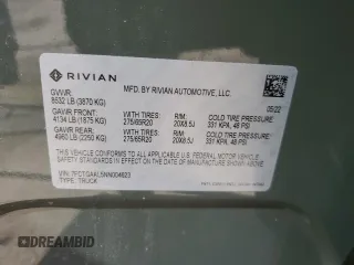 2022 Rivian R1T Launch Edition z VIN 7FCTGAAL5NN004623, wystawiony jako Copart lot #47966085 z przebiegiem 28 798 mil mil oraz Szkody całkowita. Historia ofert i sprzedaży dostępna na DreamBid. Obrazek 13.