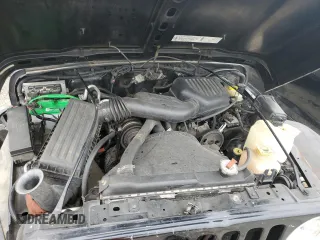 1999 Jeep Wrangler SE with VIN 1J4FY29P3XP408468, listed as a Copart auction lot 55537335 with Not provided miles and Salvage title. Bid and sale history available at DreamBid. Image 11.