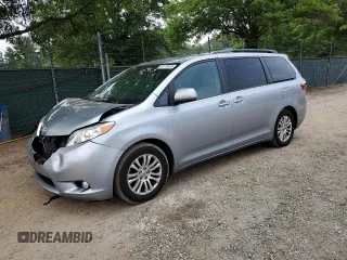2016 Toyota Sienna XLE with VIN 5TDYK3DC8GS741183, listed as a Copart auction lot 61119135 with 143,579 mi miles and Clean title. Bid and sale history available at DreamBid. Image 1.