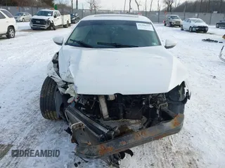 2012 Volkswagen Passat SE z VIN 1VWBN7A31CC044441, wystawiony jako IAAI lot #41390295 z przebiegiem 227 097 mil mil oraz . Historia ofert i sprzedaży dostępna na DreamBid. Obrazek 11.