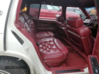 1990 Cadillac Fleetwood z VIN 1G6CB5332L4248633, wystawiony jako Copart lot #44218444 z przebiegiem 40 635 mil mil oraz Nie do naprawy. Historia ofert i sprzedaży dostępna na DreamBid. Obrazek 10.