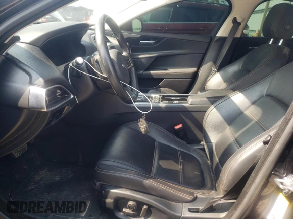 2018 Jaguar XE with VIN SAJAK4FN1JCP37010, listed as a Copart auction lot 66070803 with 84,035 mi miles and Salvage Title. Bid and sale history available at DreamBid. Image 7.