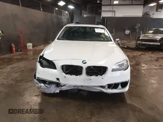2014 BMW 5 Series 528i xDrive with VIN WBA5A7C57ED612230, listed as a IAAI auction lot 41586318 with 148,676 mi miles and . Bid and sale history available at DreamBid. Image 12.