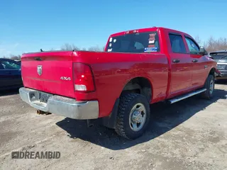 2012 Ram 2500 ST with VIN 3C6TD5CT6CG200358, listed as a IAAI auction lot 41806692 with 143,390 mi miles. Bid and sale history available at carsss.com. Image 4.