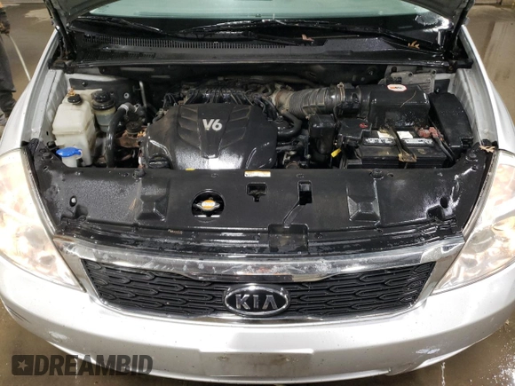 2012 Kia Sedona EX with VIN KNDMH4C7XC6483296, listed as a Copart auction lot 76624984 with 203,980 mi miles and Salvage Title. Bid and sale history available at carsss.com. Image 11.