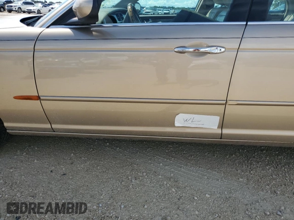 2004 Jaguar XJ with VIN SAJWA71C24SG28164, listed as a Copart auction lot 73968134 with 0 mi miles and Salvage Title. Bid and sale history available at carsss.com. Image 12.