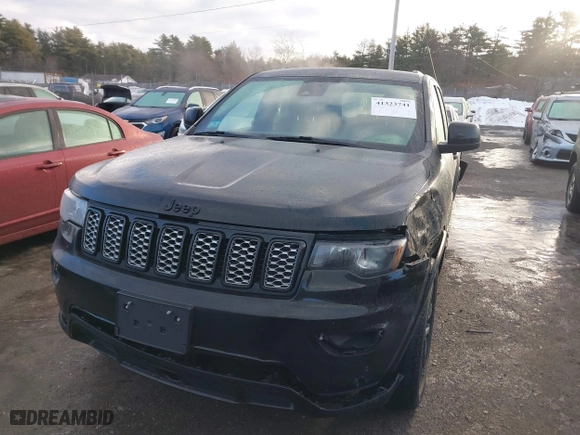 2021 Jeep Grand Cherokee Laredo X with VIN 1C4RJFAG6MC599672, listed as a IAAI auction lot 41323741 with 71,491 mi miles. Bid and sale history available at carsss.com. Image 2.
