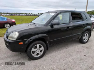 2005 Hyundai Tucson GL with VIN KM8JM12BX5U071182, listed as a Copart auction lot 74852974 with 74,235 mi miles and Salvage Title. Bid and sale history available at carsss.com. Image 1.