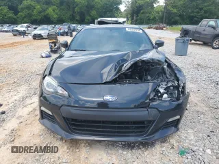 2013 Subaru BRZ Premium с VIN JF1ZCAB18D2603658, выставлен на аукционе Copart как лот 62918795 с пробегом 115 743 миль миль и Списание • Salvage title. История ставок и продаж доступна на DreamBid. Изображение 5.