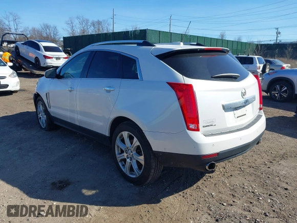 2015 Cadillac SRX Performance Collection with VIN 3GYFNFE35FS573814, listed as a IAAI auction lot 41770696 with 119,205 mi miles and . Bid and sale history available at DreamBid. Image 3.