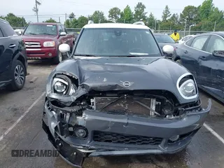 2020 MINI Countryman Cooper S with VIN WMZYW7C0XL3L85463, listed as a IAAI auction lot 42344478 with 54,654 mi miles and . Bid and sale history available at DreamBid. Image 12.