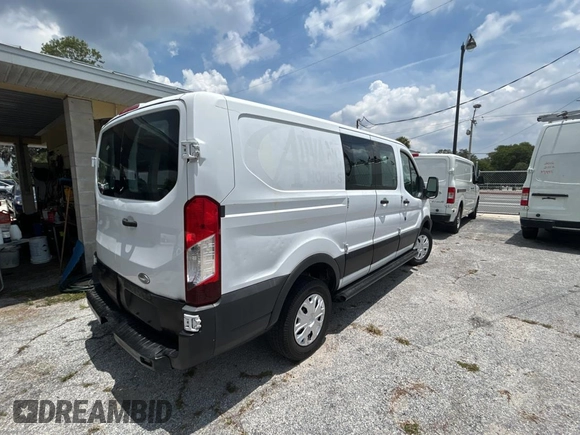 2015 Ford Transit Cargo with VIN 1FTNR1ZM6FKA47229, listed as a Copart auction lot 64808455 with 227,682 mi miles and Clean title. Bid and sale history available at DreamBid. Image 4.
