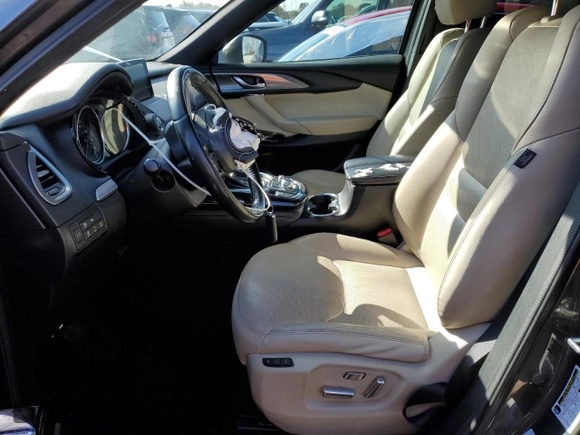 2017 Mazda CX-9 Grand Touring z VIN JM3TCADY8H0138866, wystawiony jako Copart lot #80894184 z przebiegiem Nie podano mil oraz Szkoda całkowita • Salvage title. Historia ofert i sprzedaży dostępna na DreamBid. Obrazek 7.