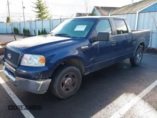 2005 Ford F-150 XLT with VIN 1FTRW12W25KB58736, listed as a IAAI auction lot 41119113 with 218,797 mi miles. Bid and sale history available at carsss.com. Image 2.