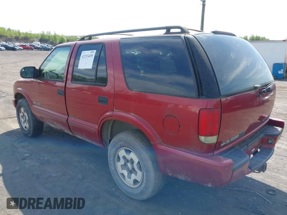 2002 Chevrolet Blazer LS z VIN 1GNDT13WX2K237284, wystawiony jako IAAI lot #42193499 z przebiegiem 137 258 mil mil oraz . Historia ofert i sprzedaży dostępna na DreamBid. Obrazek 3.