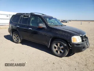 2002 GMC Envoy SLT with VIN 1GKDT13S022107749, listed as a Copart auction lot 59548544 with 221,224 mi miles and Clean Title. Bid and sale history available at DreamBid. Image 4.