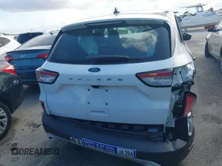 2021 Ford Escape S with VIN 1FMCU0F61MUA36822, listed as a IAAI auction lot 31372199 with 3,842 mi miles and . Bid and sale history available at DreamBid. Image 15.