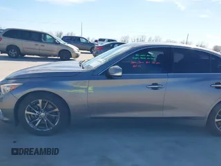 2015 Infiniti Q50 Premium with VIN JN1BV7AP0FM355933, listed as a IAAI auction lot 41684066 with 116,230 mi miles and . Bid and sale history available at DreamBid. Image 15.