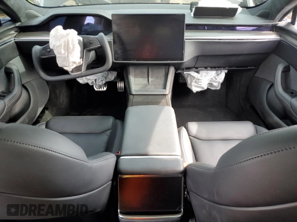 2021 Tesla Model S Plaid with VIN 5YJSA1E6XMF456295, listed as a Copart auction lot 55877025 with Not provided miles and Salvage title. Bid and sale history available at DreamBid. Image 8.