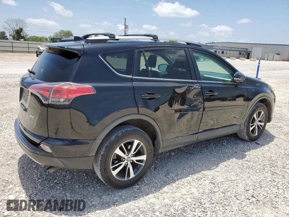 2018 Toyota RAV4 XLE with VIN 2T3WFREV7JW429716, listed as a Copart auction lot 64309045 with 156,445 mi miles and Salvage title. Bid and sale history available at DreamBid. Image 3.