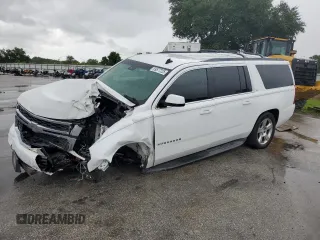 2015 Chevrolet Suburban LT z VIN 1GNSCJKC7FR203718, wystawiony jako Copart lot #59577225 z przebiegiem Nie podano mil oraz Szkoda całkowita • Salvage title. Historia ofert i sprzedaży dostępna na DreamBid. Obrazek 1.