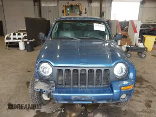 2004 Jeep Liberty Limited with VIN 1J4GK58K84W226666, listed as a IAAI auction lot 41764238 with 148,664 mi miles. Bid and sale history available at carsss.com. Image 12.