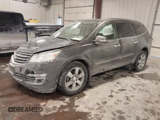2015 Chevrolet Traverse LTZ with VIN 1GNKVJKD8FJ360899, listed as a IAAI auction lot 41634924 with 165,835 mi miles and . Bid and sale history available at DreamBid. Image 2.