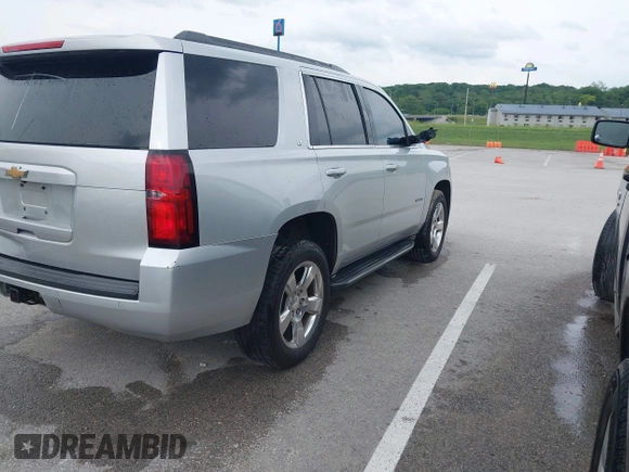 2015 Chevrolet Tahoe LT with VIN 1GNSKBKC3FR224753, listed as a IAAI auction lot 42284497 with 198,943 mi miles and . Bid and sale history available at DreamBid. Image 17.