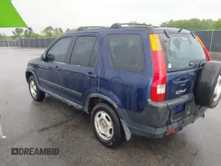 2004 Honda CR-V LX with VIN SHSRD68404U201676, listed as a IAAI auction lot 42109894 with 281,006 mi miles and . Bid and sale history available at carsss.com. Image 3.