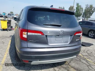 2020 Honda Pilot EX-L z VIN 5FNYF6H50LB047202, wystawiony jako IAAI lot #42117776 z przebiegiem 119 726 mil mil oraz . Historia ofert i sprzedaży dostępna na DreamBid. Obrazek 17.
