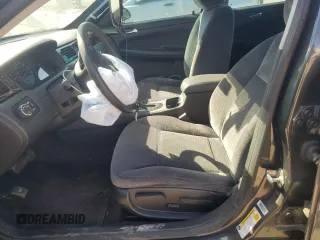2016 Chevrolet Impala LS with VIN 2G1WA5E32G1111728, listed as a Copart auction lot 76654464 with 83,299 mi miles and Salvage title. Bid and sale history available at DreamBid. Image 7.