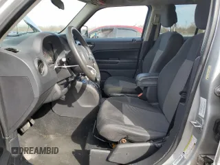 2012 Jeep Patriot Sport with VIN 1C4NJPBBXCD511285, listed as a Copart auction lot 49825915 with 197,269 mi miles and Salvage Title. Bid and sale history available at DreamBid. Image 7.