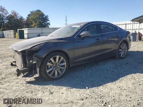 2021 Mazda 6 Signature with VIN JM1GL1XY0M1617051, listed as a Copart auction lot 76715774 with 43,925 mi miles and Salvage Title. Bid and sale history available at DreamBid. Image 1.
