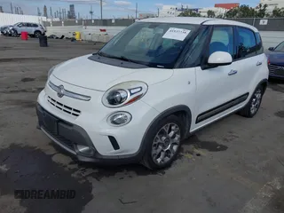 2015 FIAT 500L Urbana Trekking with VIN ZFBCFADH0FZ036456, listed as a IAAI auction lot 41537239 with 141,162 mi miles and . Bid and sale history available at DreamBid. Image 2.
