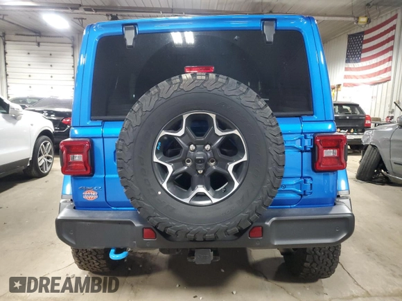 2022 Jeep Wrangler Unlimited Rubicon with VIN 1C4JJXR69NW190564, listed as a Copart auction lot 83703504 with 16,803 mi miles and Salvage title. Bid and sale history available at DreamBid. Image 6.