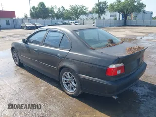 2000 BMW 5 Series 528i z VIN WBADM6348YGU16191, wystawiony jako IAAI lot #42295709 z przebiegiem 208 067 mil mil oraz . Historia ofert i sprzedaży dostępna na DreamBid. Obrazek 3.
