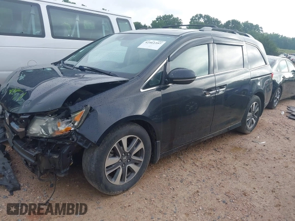 2015 Honda Odyssey Touring Elite with VIN 5FNRL5H90FB065004, listed as a IAAI auction lot 42461597 with 317,523 mi miles and . Bid and sale history available at DreamBid. Image 17.