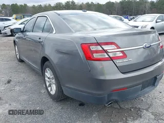 2014 Ford Taurus SE z VIN 1FAHP2D88EG143275, wystawiony jako IAAI lot #41801787 z przebiegiem 150 988 mil mil oraz . Historia ofert i sprzedaży dostępna na DreamBid. Obrazek 3.